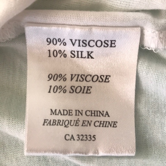 White t-shirt with cute ruffles sleeves - Picture 5 of 5